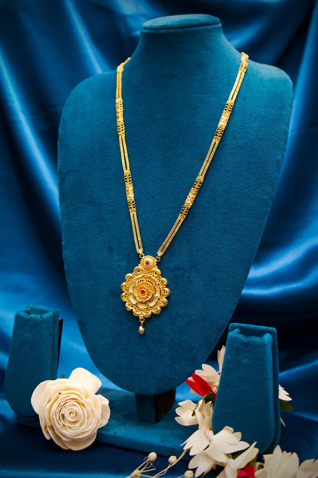 Traditional Floral Medallion Pendant Mangalsutra with Ruby Stone Accent