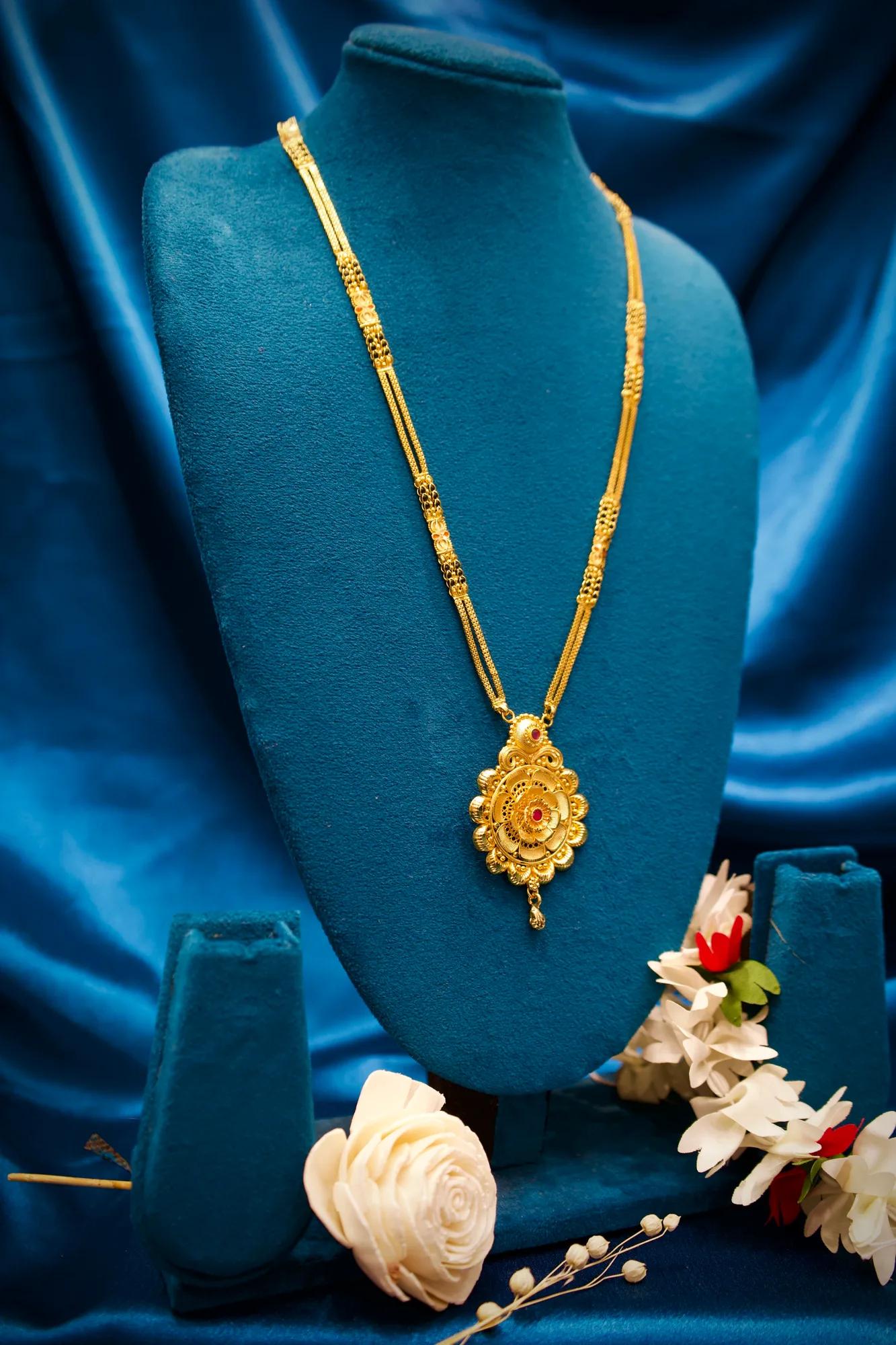 Traditional Floral Medallion Pendant Mangalsutra with Ruby Stone Accent