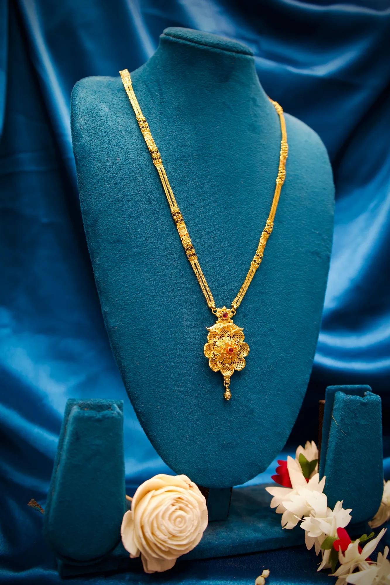 Traditional Floral Medallion Pendant Mangalsutra with Ruby Stone Detail