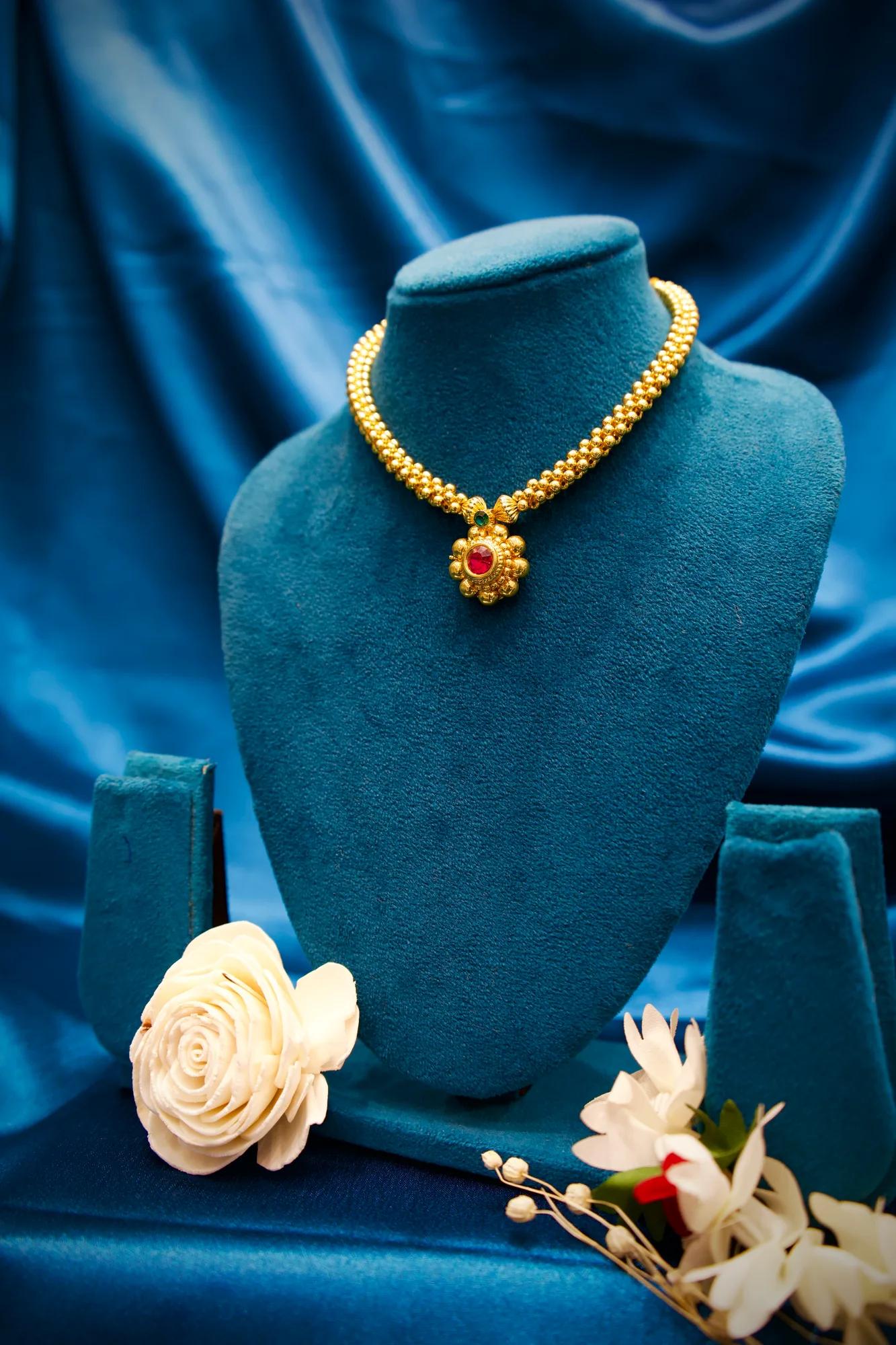 Traditional Floral Gold Bead Necklace with Ruby Stone Pendant