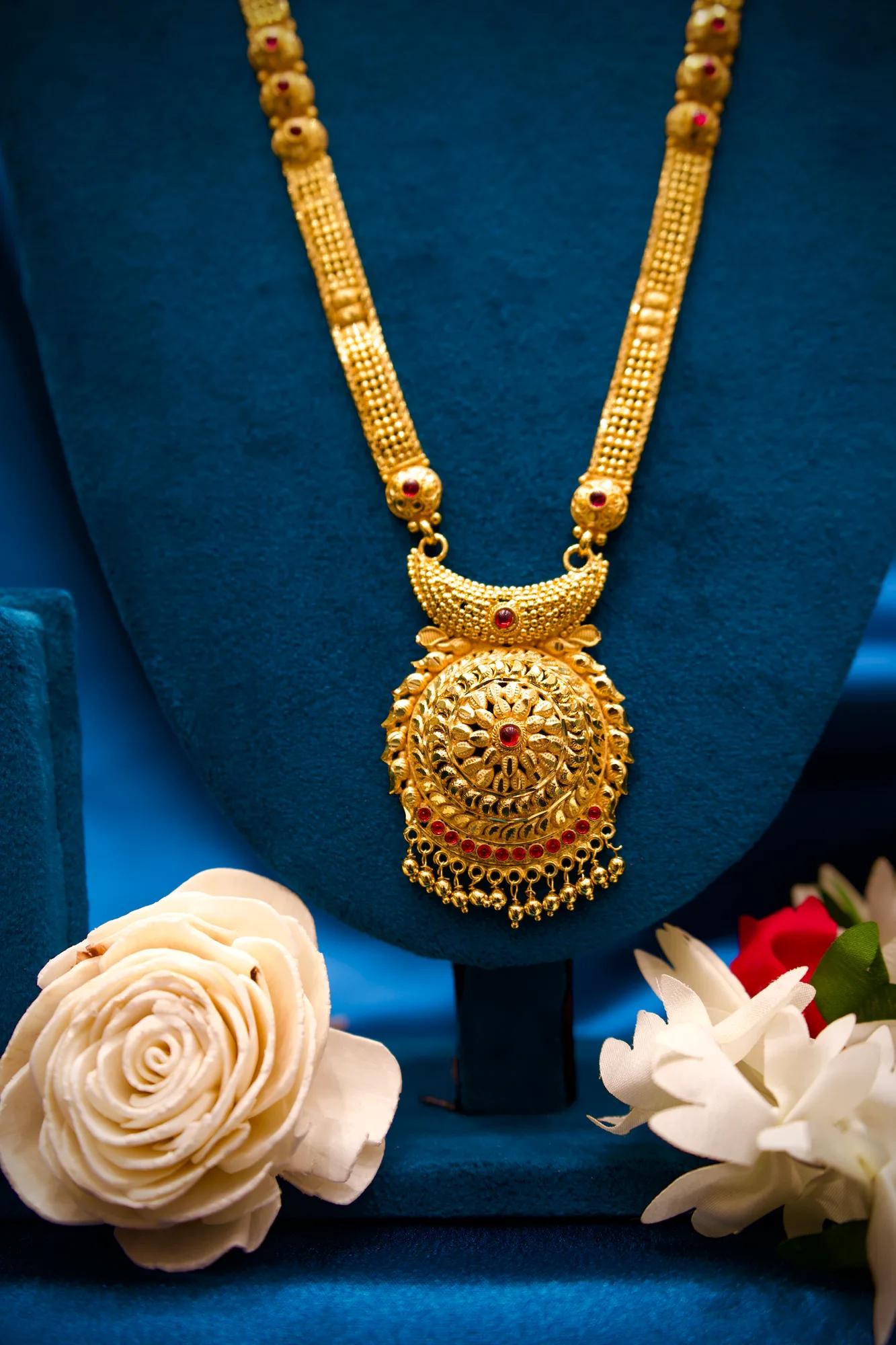Antique Gold Finish Long Haram Mangalsutra with Floral Temple Pendant