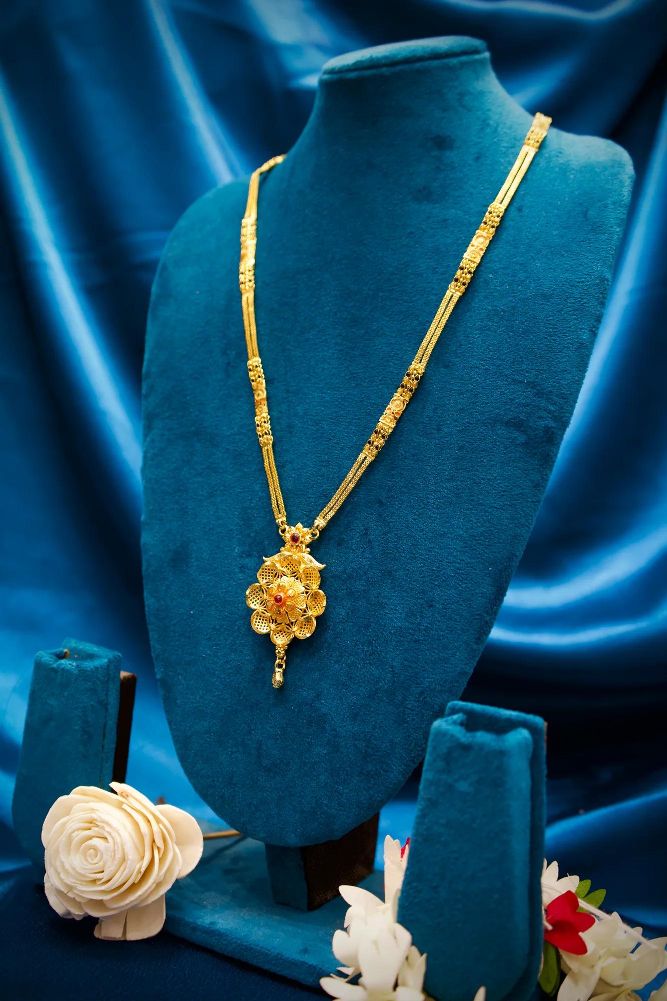 Traditional Floral Medallion Pendant Mangalsutra with Ruby Stone Detail