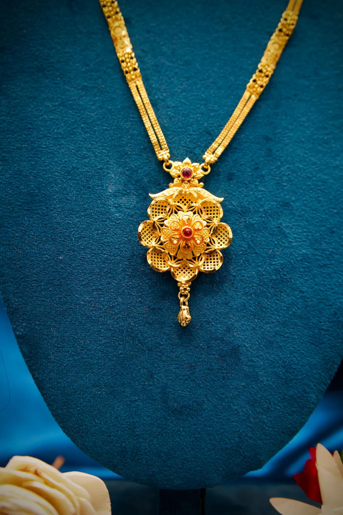 Traditional Floral Medallion Pendant Mangalsutra with Ruby Stone Detail