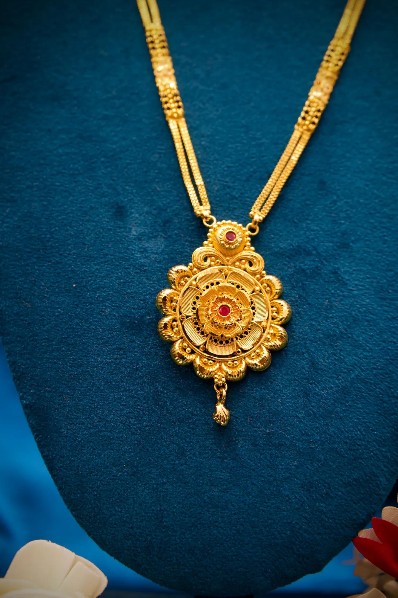 Traditional Floral Medallion Pendant Mangalsutra with Ruby Stone Accent