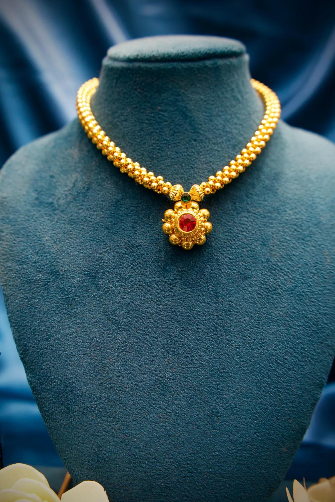 Traditional Floral Gold Bead Necklace with Ruby Stone Pendant