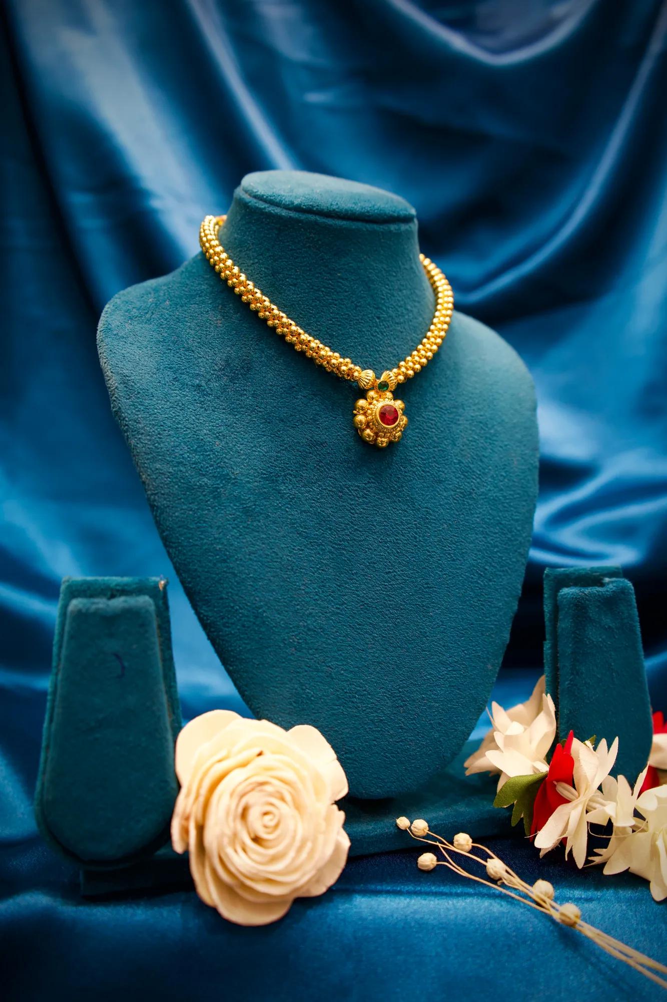 Traditional Floral Gold Bead Necklace with Ruby Stone Pendant