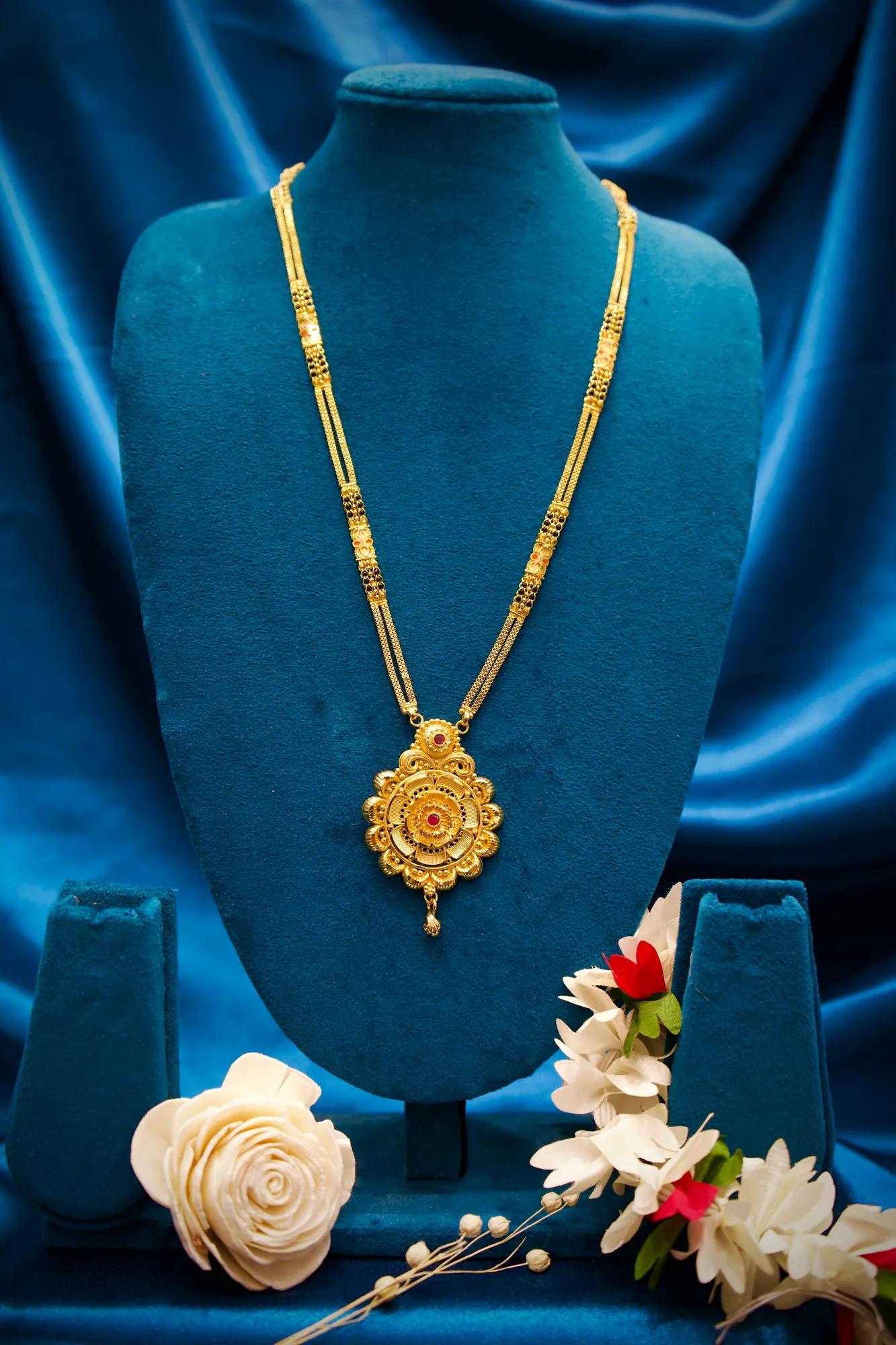 Traditional Floral Medallion Pendant Mangalsutra with Ruby Stone Accent