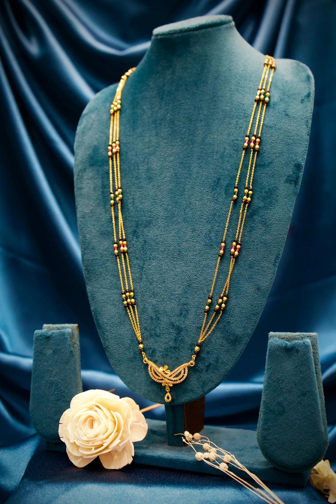Elegant Multi-Strand Mangalsutra with Crystal Leaf Pendant