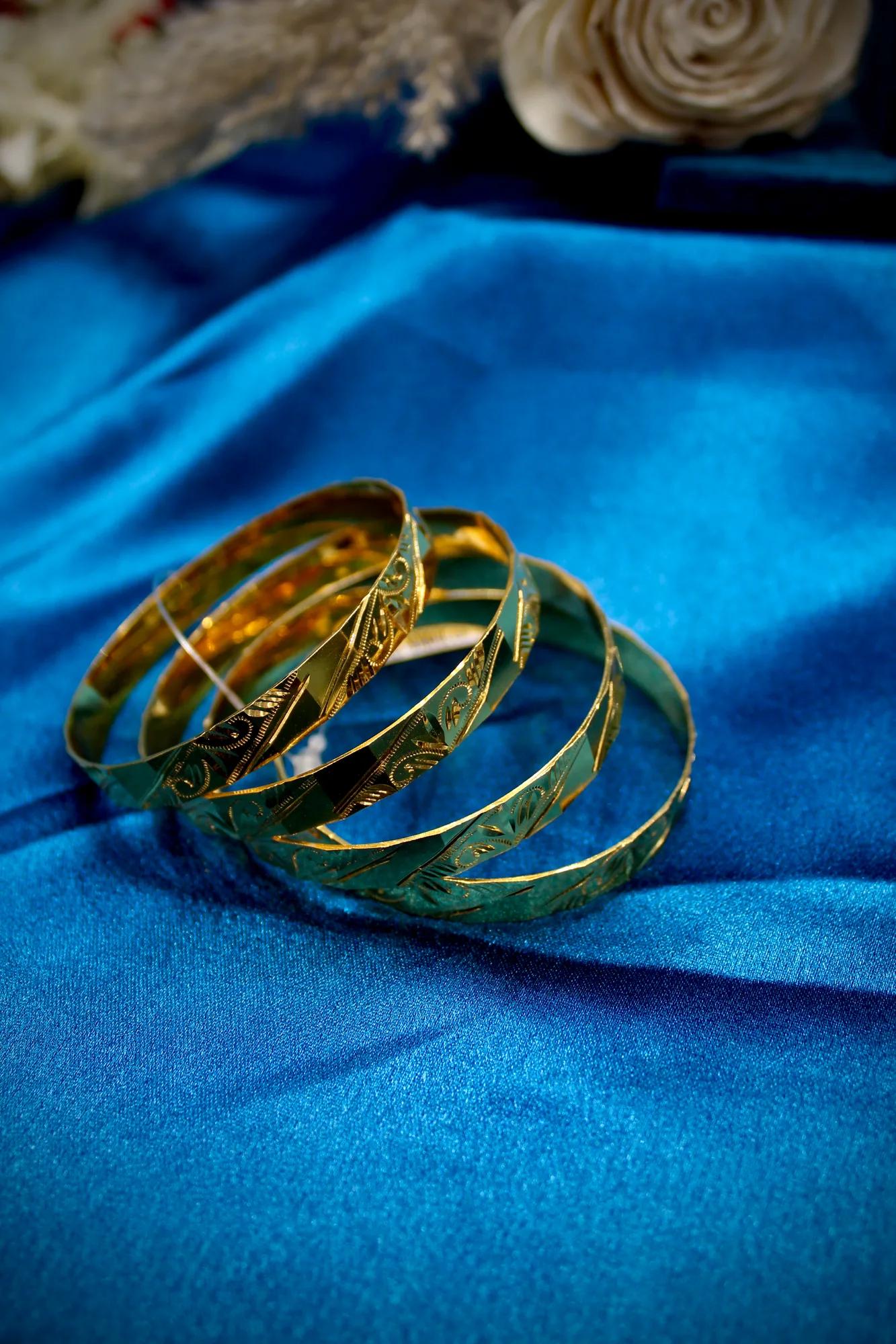 Designer Engraved Gold Finish Bangle Set
