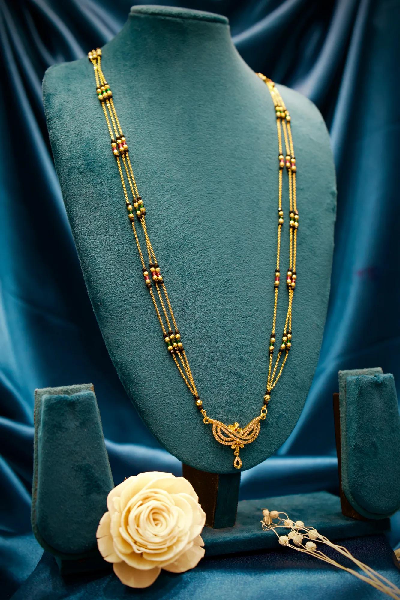 Elegant Multi-Strand Mangalsutra with Crystal Leaf Pendant