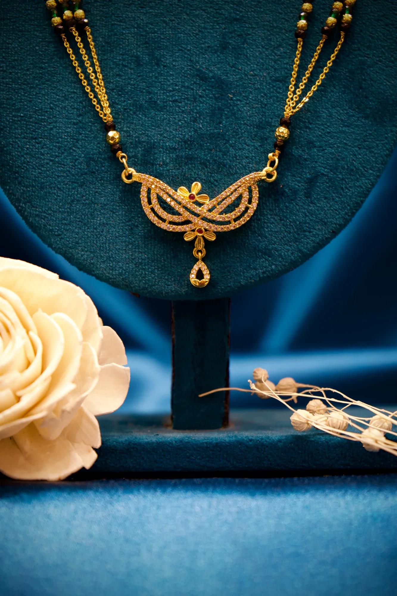 Elegant Multi-Strand Mangalsutra with Crystal Leaf Pendant