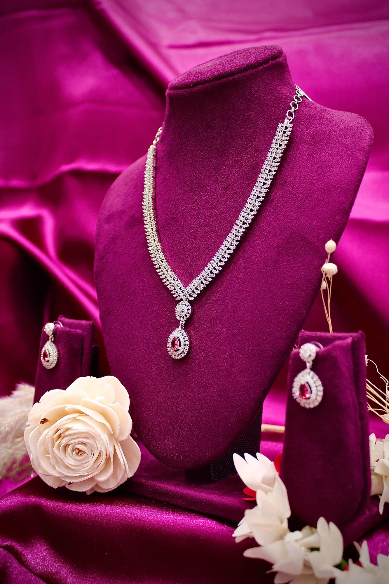 Elegant American Diamond Necklace with Ruby Drop Pendant