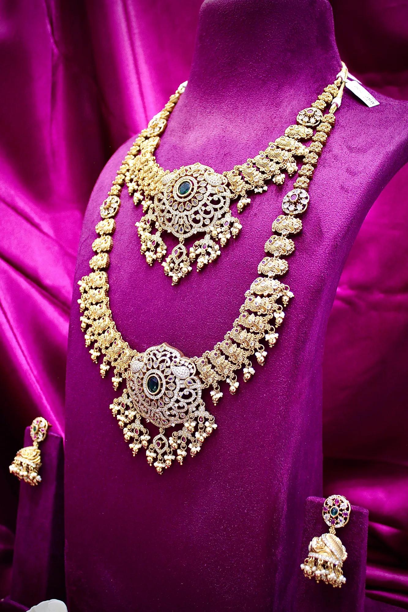 Royal Antique Gold-Plated Dual Layer Temple Necklace Set with Green Stone Pendant & Jhumka Earrings