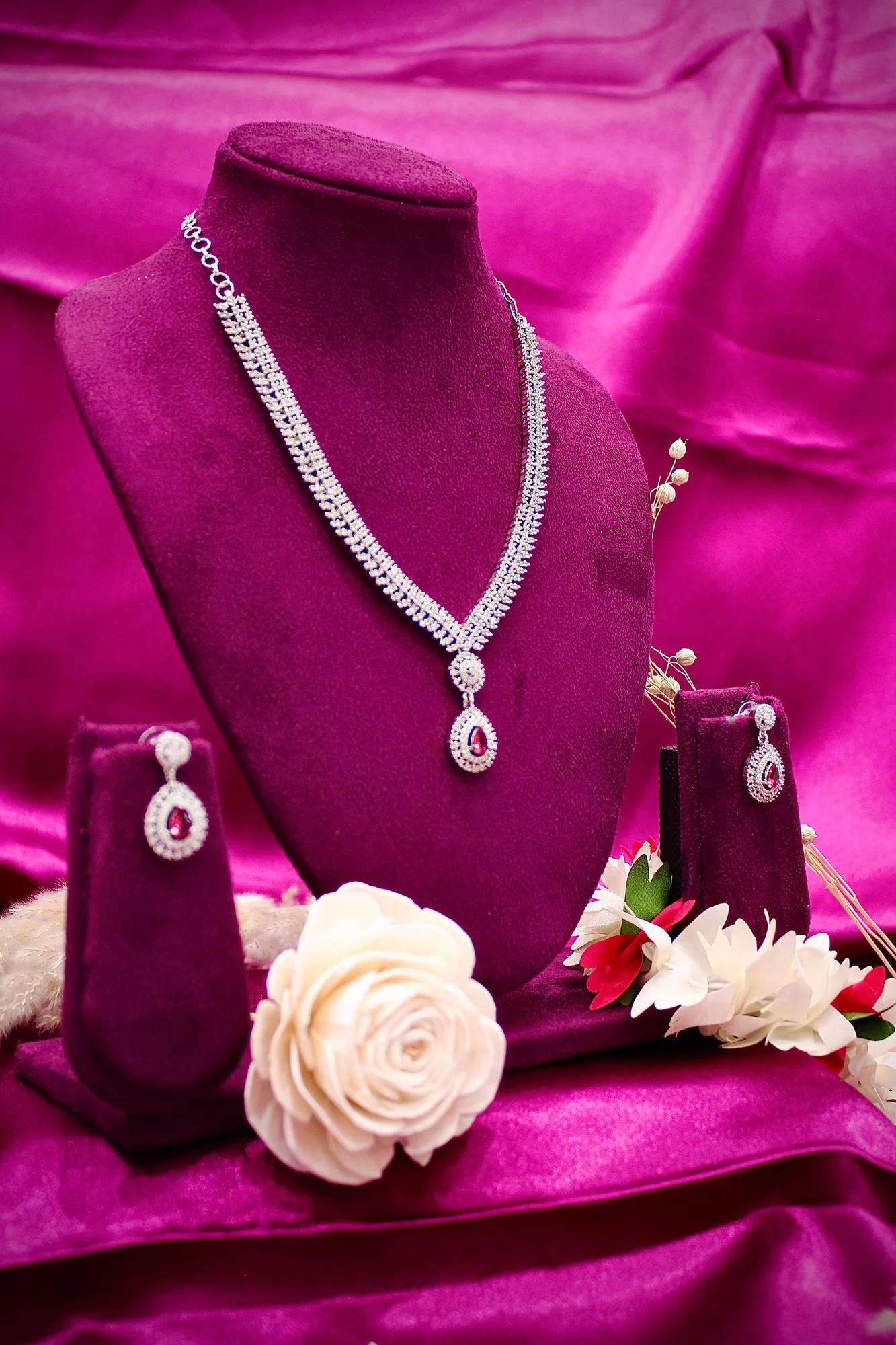 Elegant American Diamond Necklace with Ruby Drop Pendant
