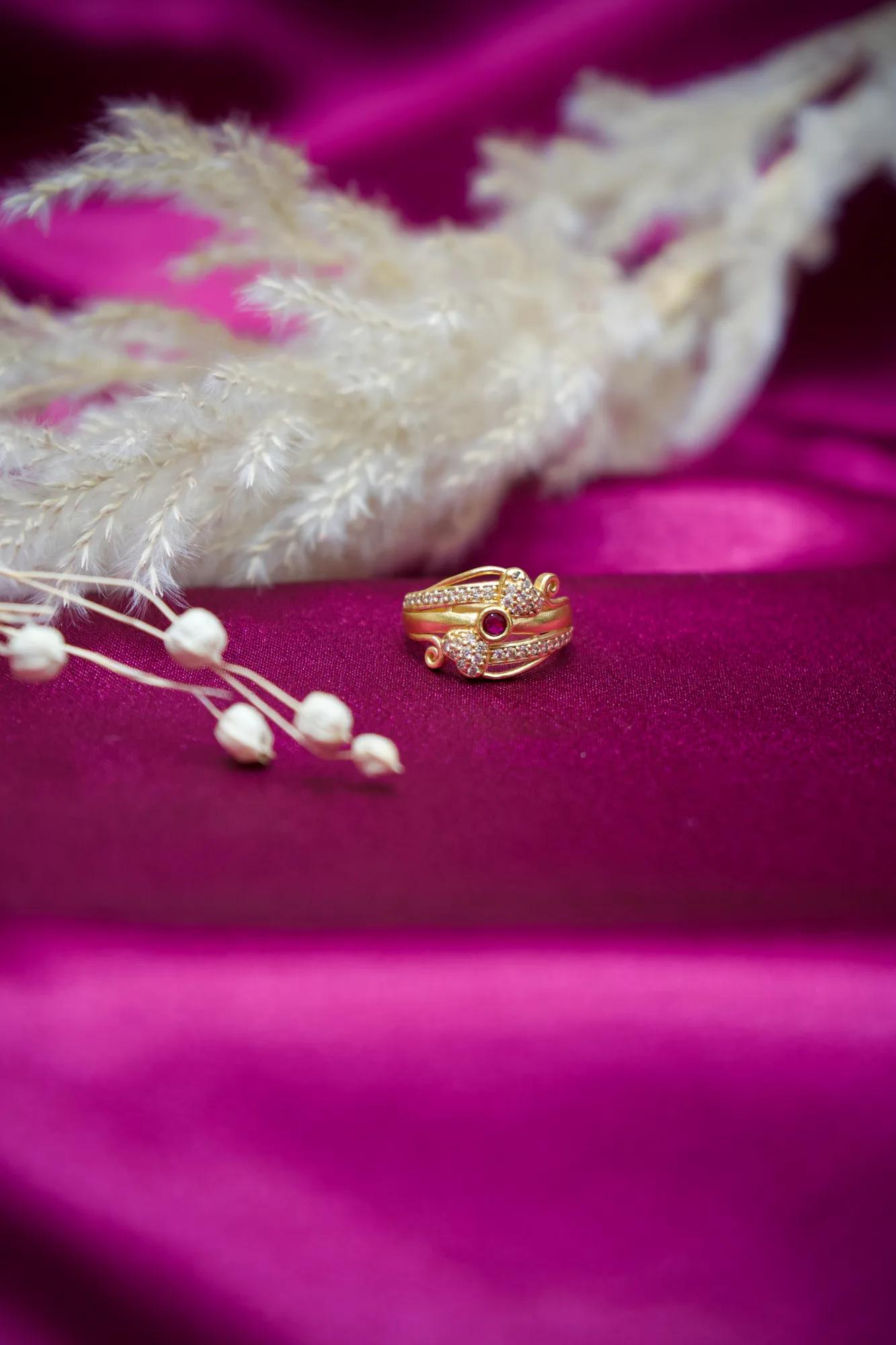 Elegant Gold-Tone CZ Floral Ring with Ruby Stone Accent
