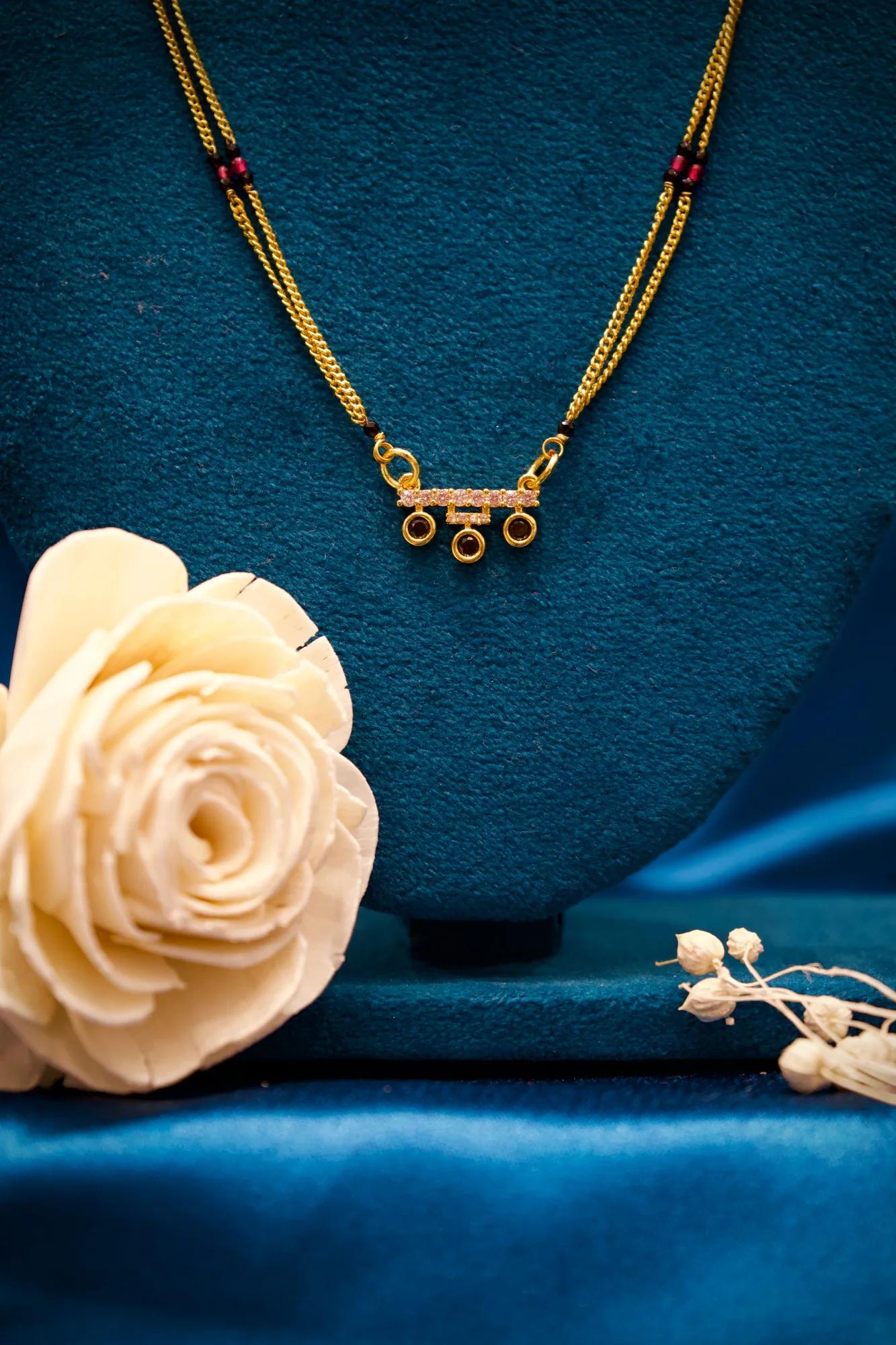 Elegant Triple Charm Mangalsutra Necklace with Pink Bead Accents