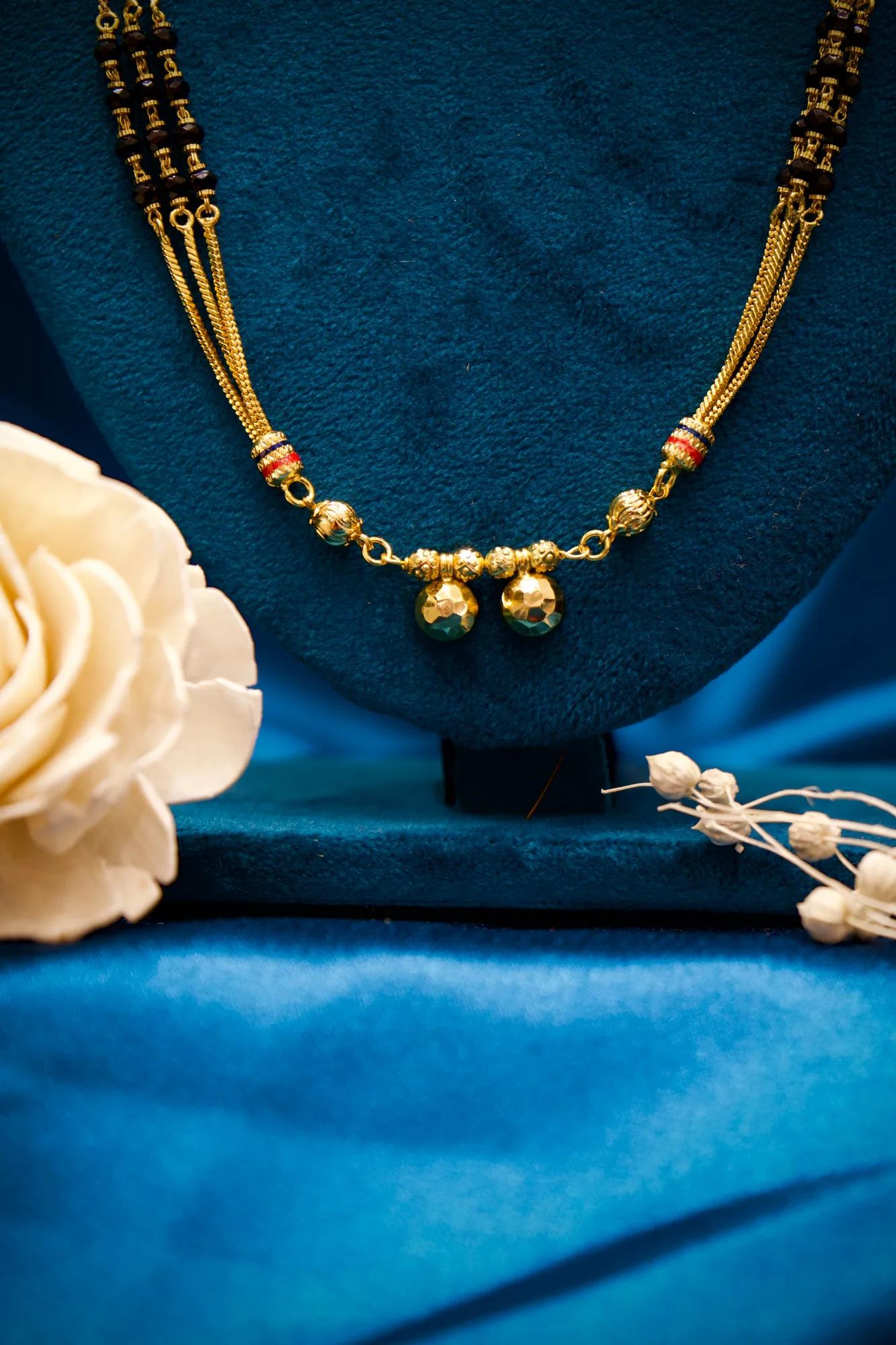 Traditional Triple-Strand Black Bead Mangalsutra with Dual Gold Charms