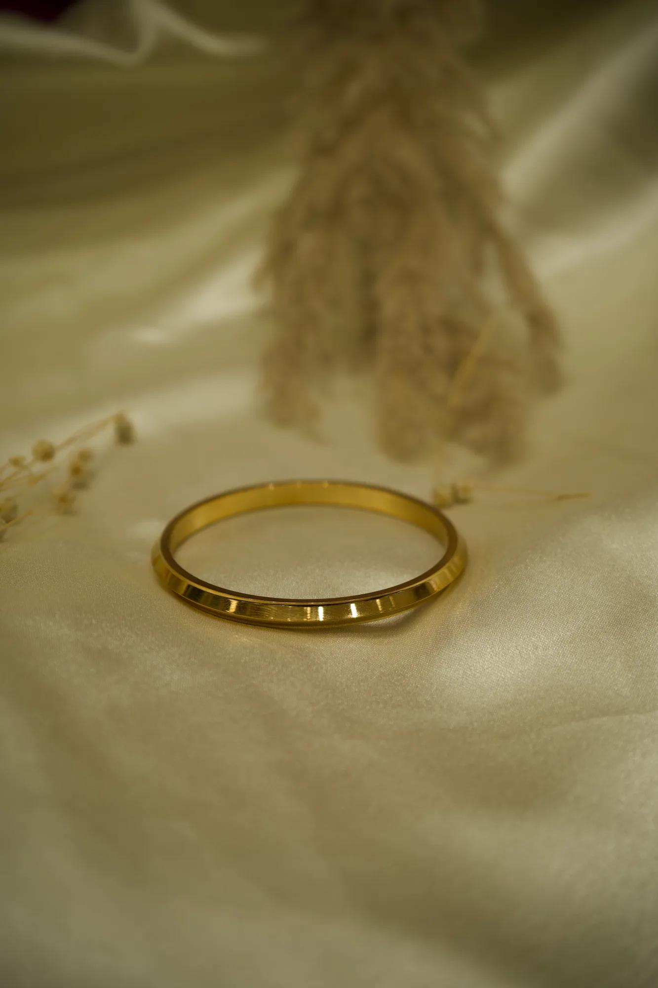 Classic Faceted Gold-Tone Bangle