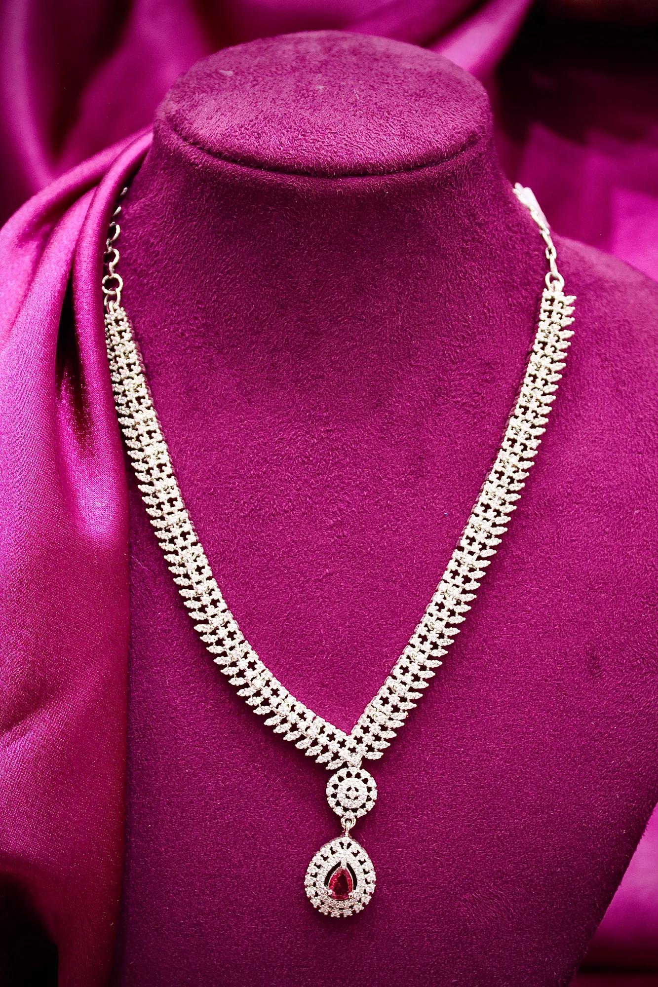 Elegant American Diamond Necklace with Ruby Drop Pendant