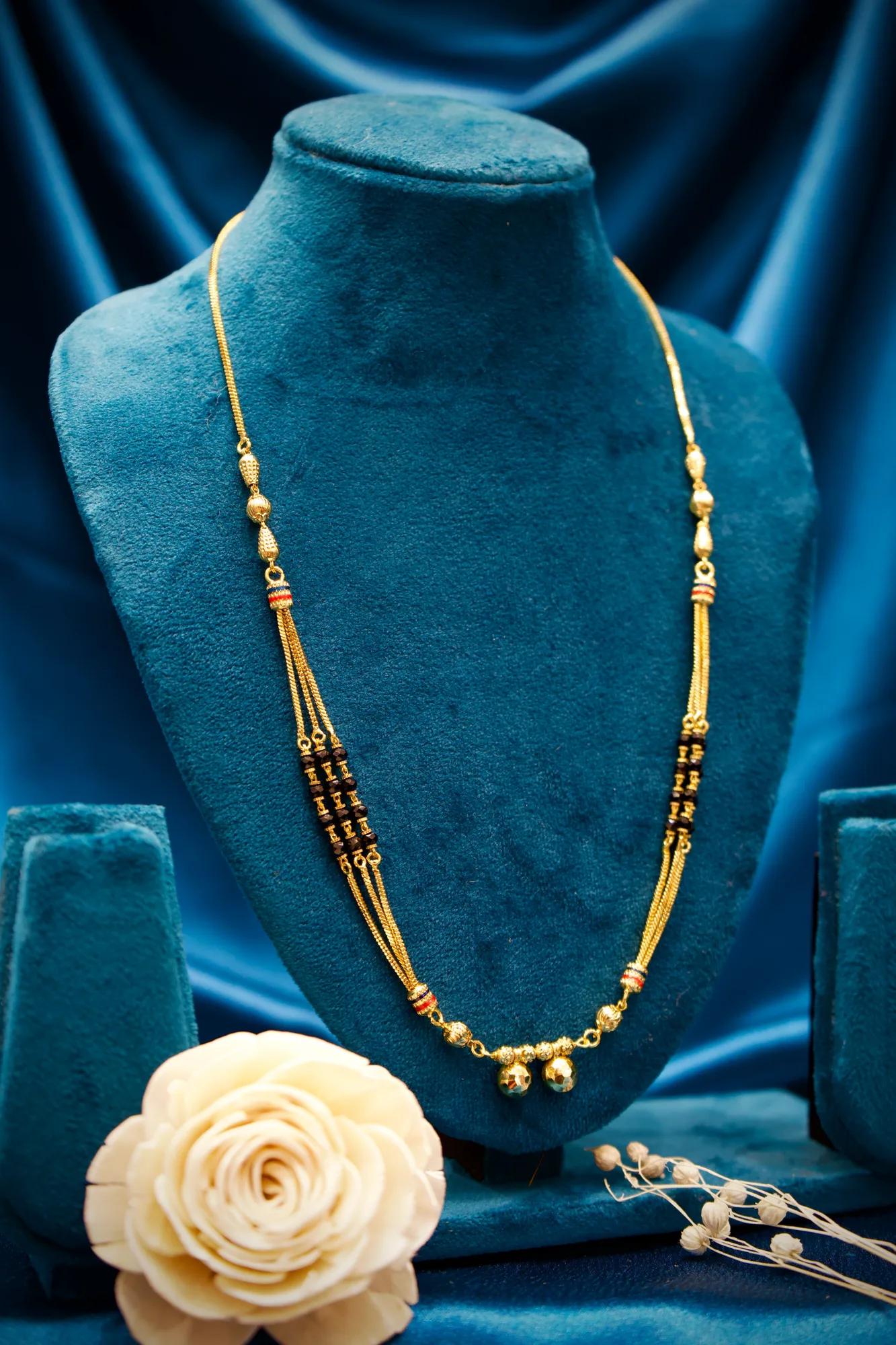 Traditional Triple-Strand Black Bead Mangalsutra with Dual Gold Charms