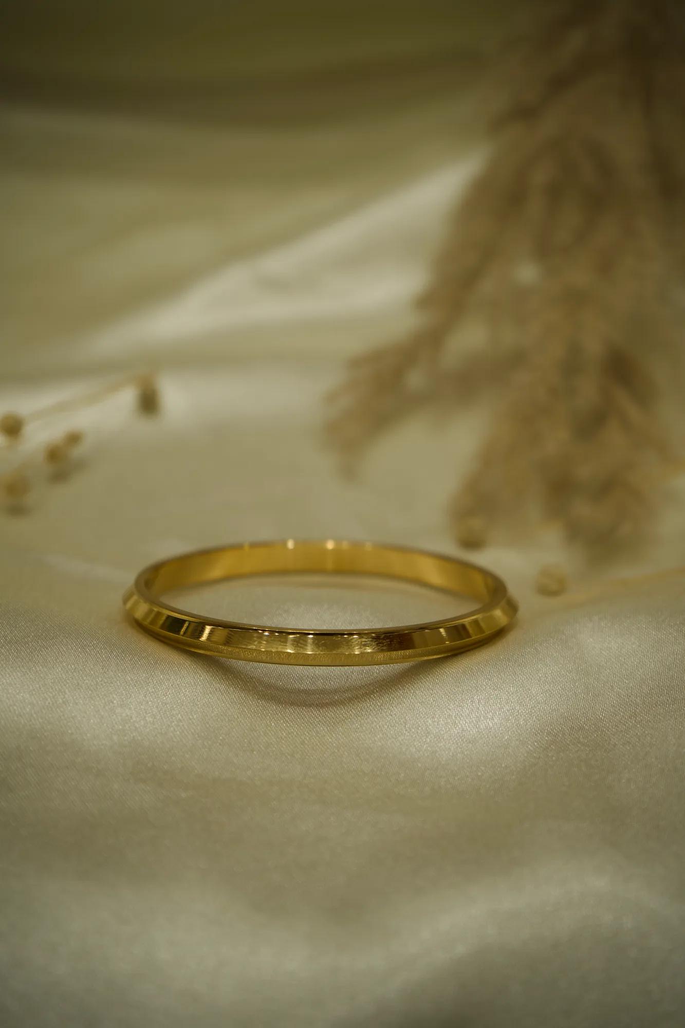 Classic Faceted Gold-Tone Bangle