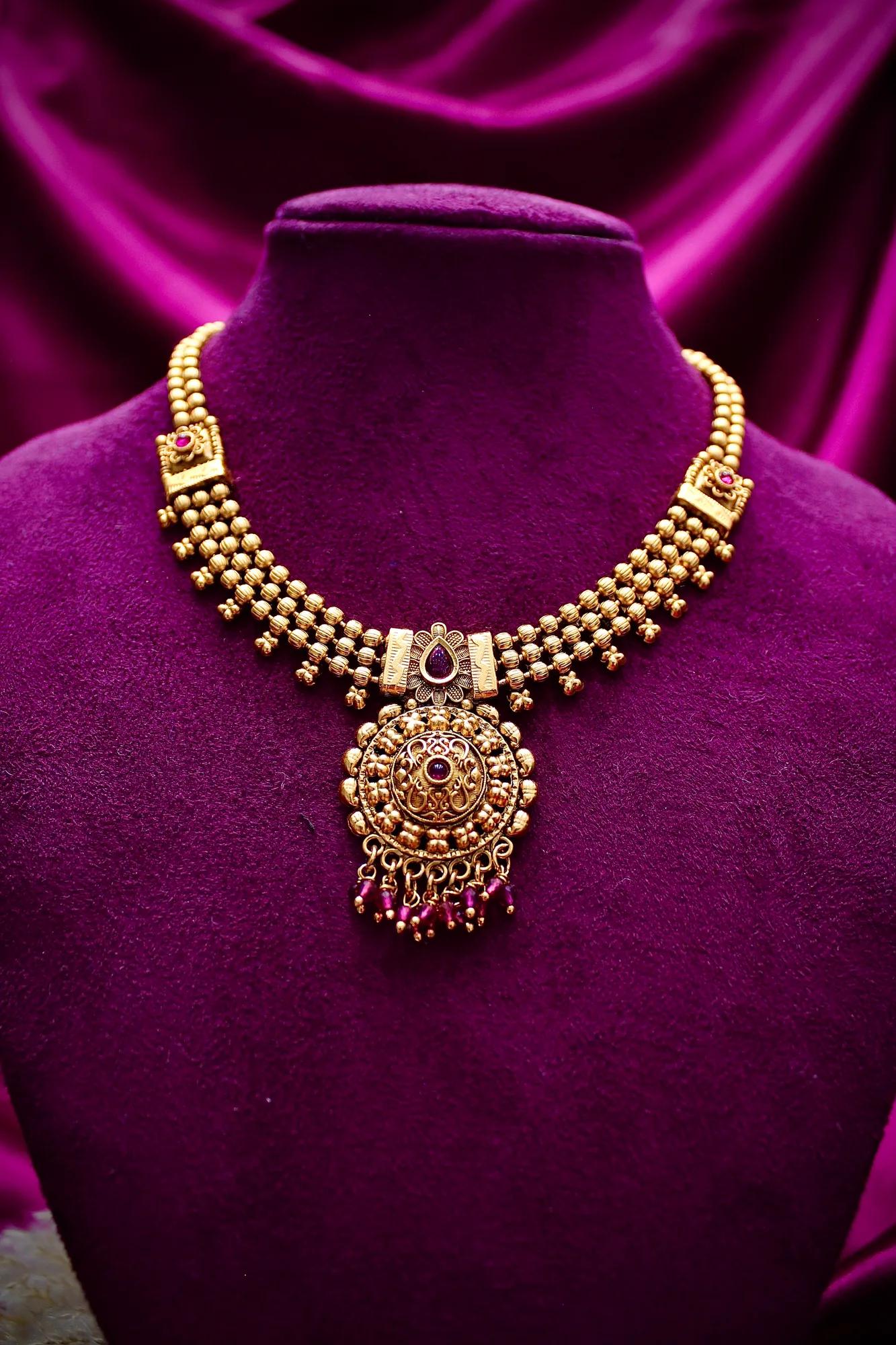 Antique Gold-Tone Pendant Necklace Set with Jhumka Earrings