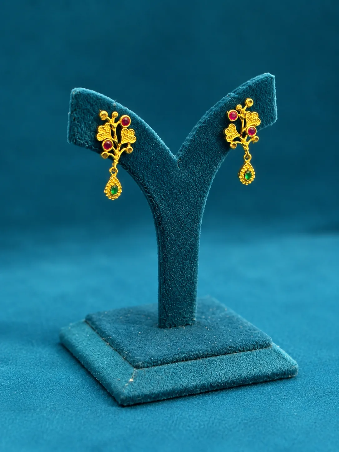 Elegant Floral AD Drop Stud Earrings with Emerald Accent